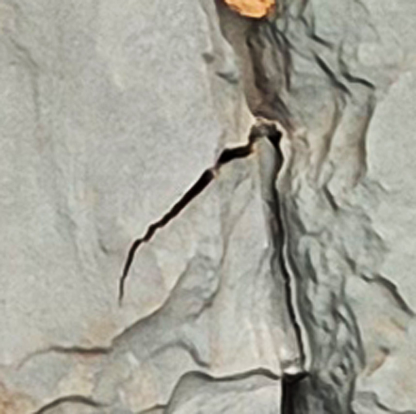 Impact mark from hail on roof surface